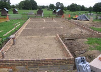 Image of a the foundations five bedroomed oak framed farm house under construction