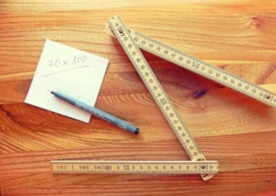 Image of a folding ruler and pen